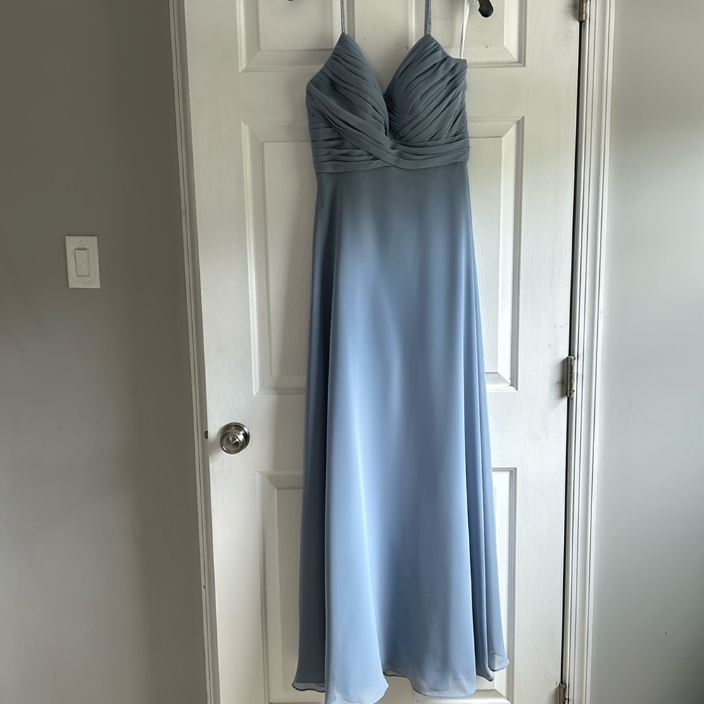 Blue bridesmaids dress by Christina Wu Celebration Collection.